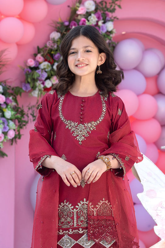 shirt adorned with sequin embroidery and delicate hanging pearls.